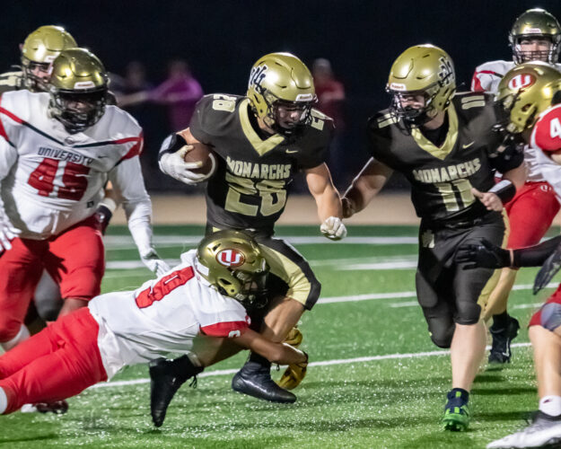 University Slips Past John Marshall, 16-14